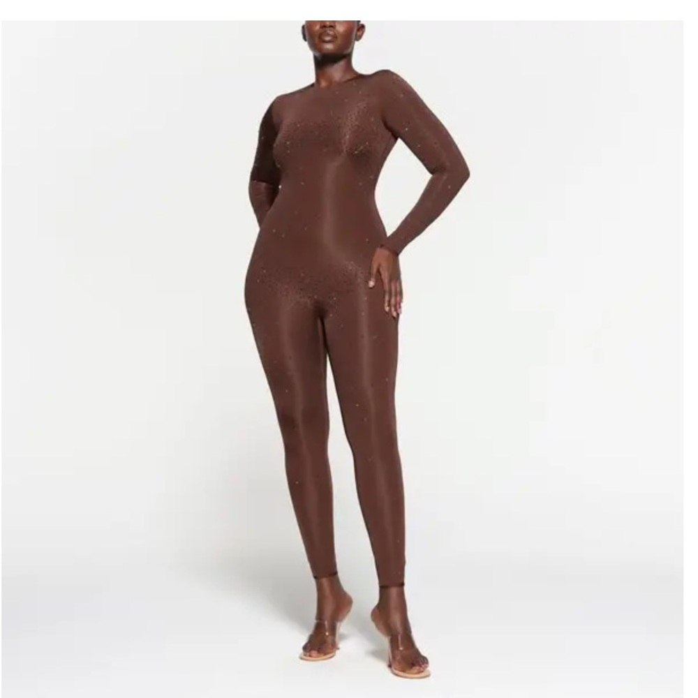 Skims Swarovski jelly sheer fully length cat suit.